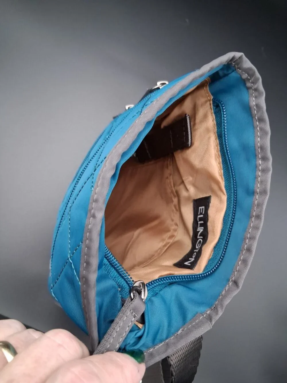 Ellington Teal Quilted Crossbody Bag with Two Front Zip Pockets. Casual style.